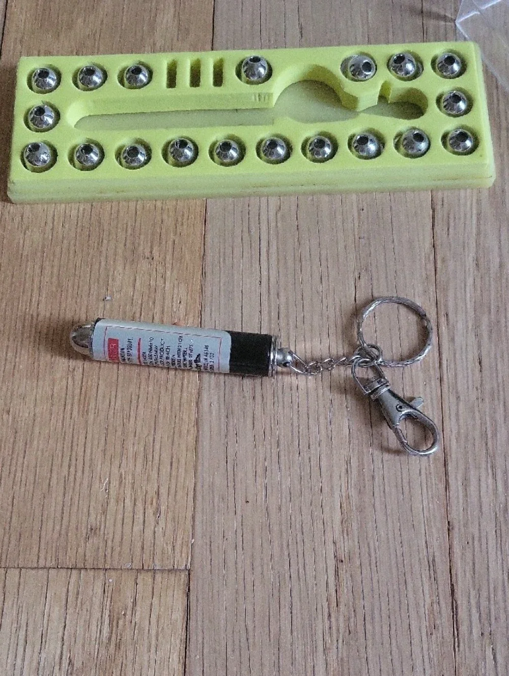 Source Unknown Cat Toy Laser Keychain with Yellow Tray